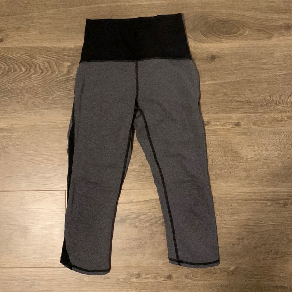 Lululemon high-rise capri leggings with mesh, size 4.